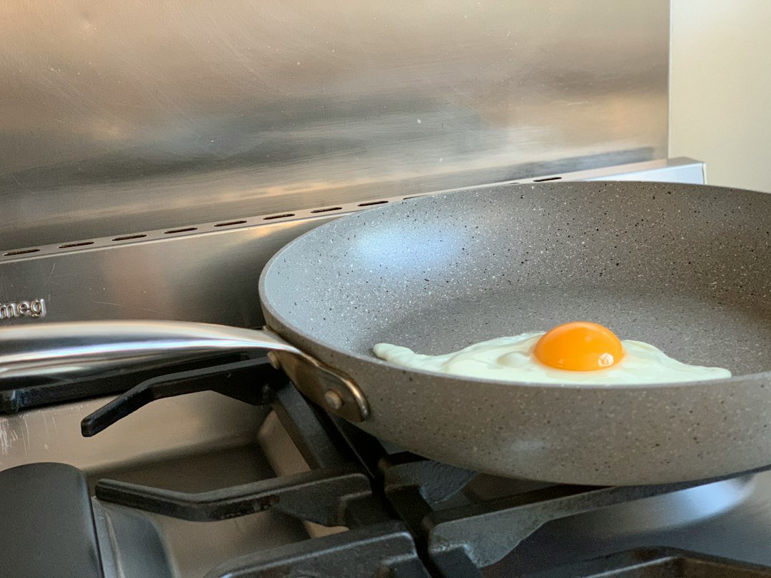 egg on black frying pan