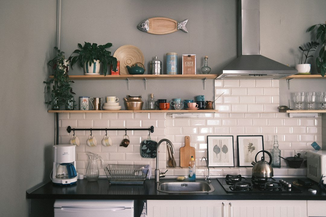 a kitchen with a shelf and shelves