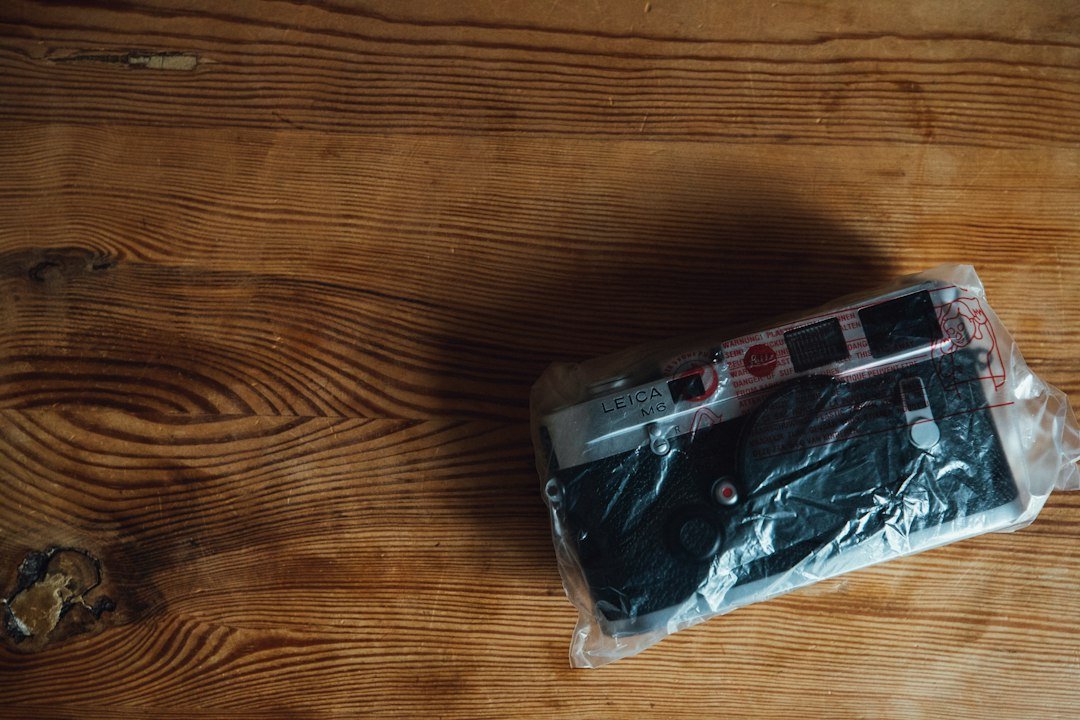 a plastic bag with a cell phone inside of it